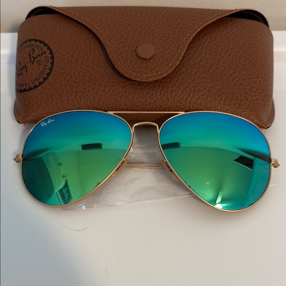 Ray-Ban Gold Aviator Sunglasses with Blue-Green Lenses